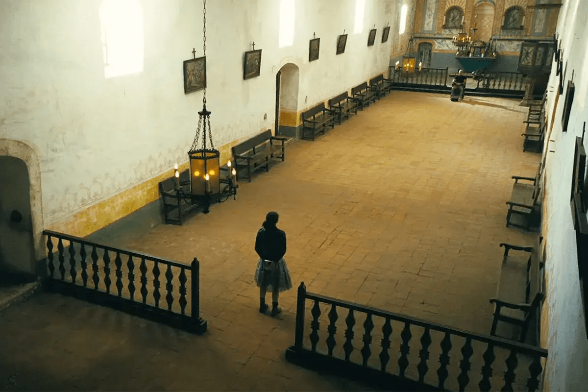 The Cathedral scene with Willa and Lockjaw each positioned at the end of the frame