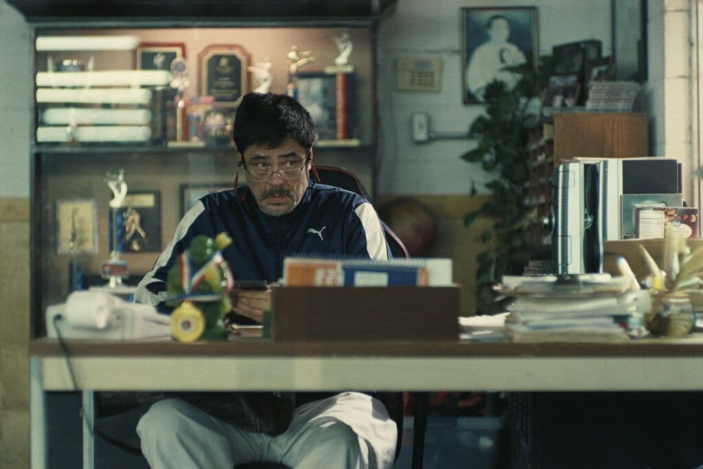 Sensei, played by Benicio del Toro — a calm yet quietly charismatic activist.